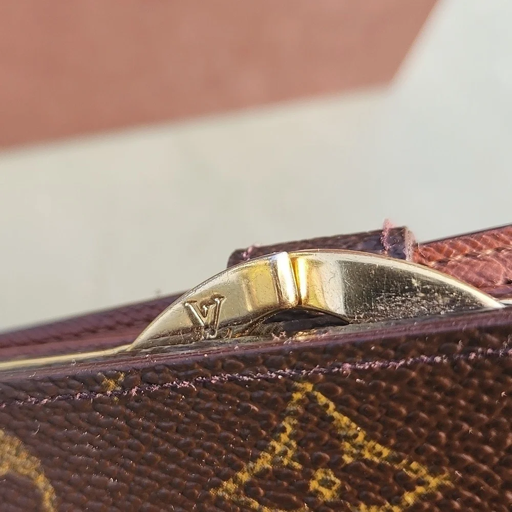 Authentic Louis Vuitton kisslock wallet